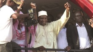 President-Elect Adama Barrow gesturing to the crowd in Kololi following his victory in the polls.